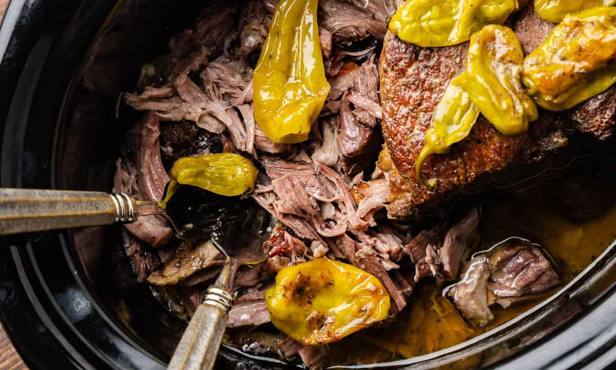 Mississippi Pork Roast shredded in slow cooker.