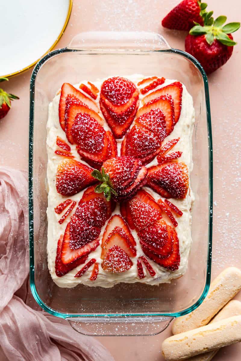 Overhead view of Strawberries Cream Tiramisu in a pan.