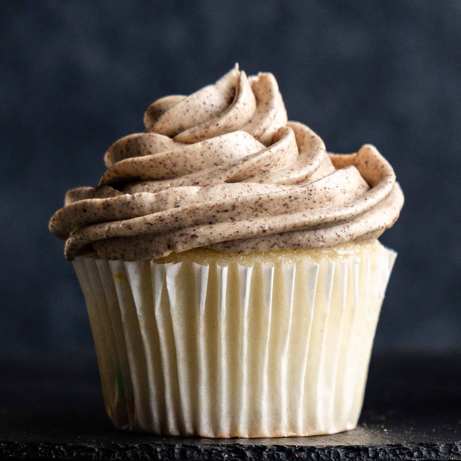 One cupcake frosted with browned butter frosting.