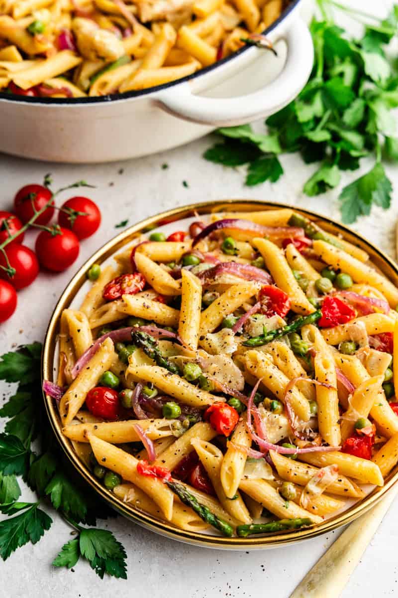 Closeup of Creamy Pasta Primavera on a plate.