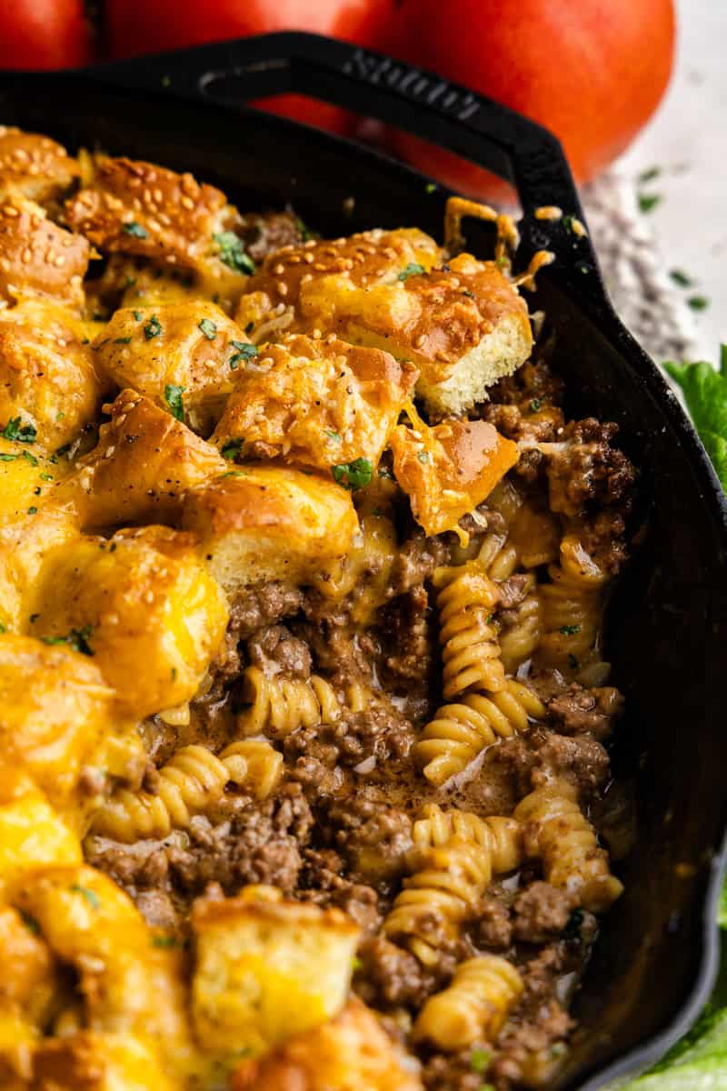 Closeup of cheeseburger casserole in cast iron.