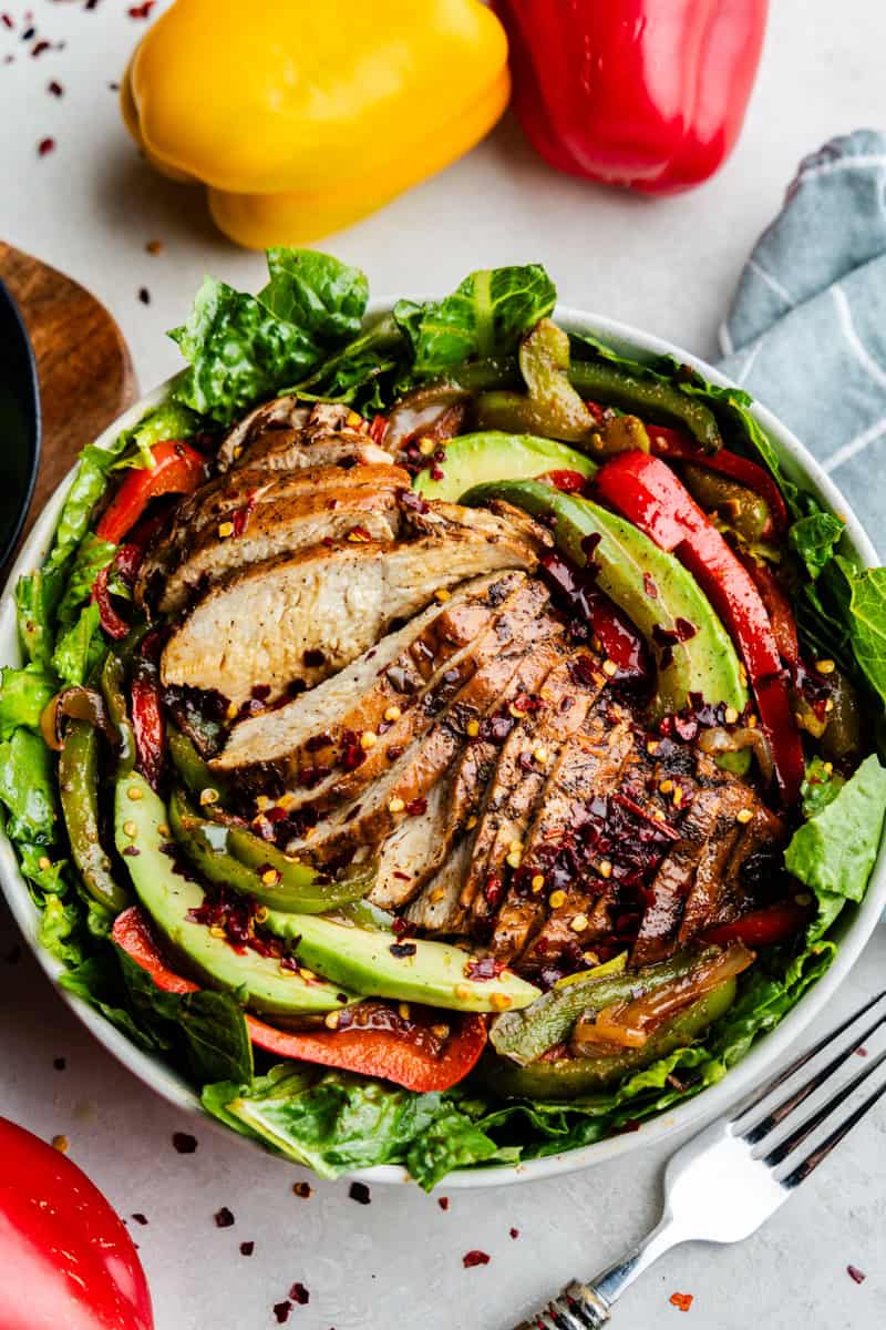 Overhead shot of cut skinny chicken fugita salad.
