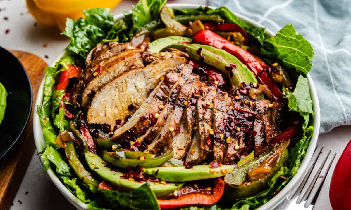 Closeup shot of sliced skinny chicken fajita salad.