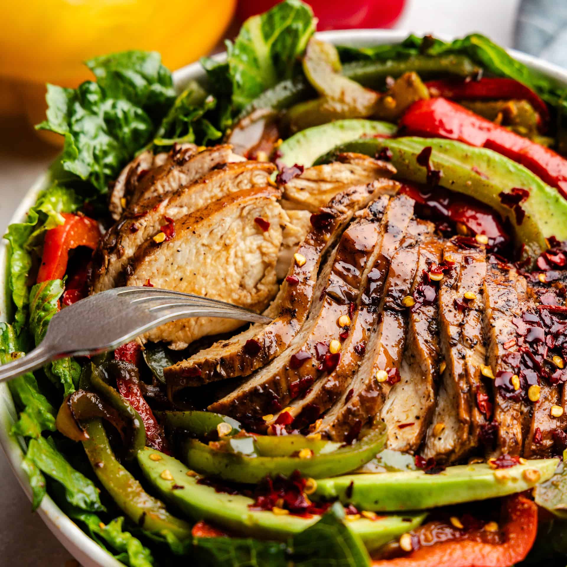 Closeup shot of sliced skinny chicken fajita salad.