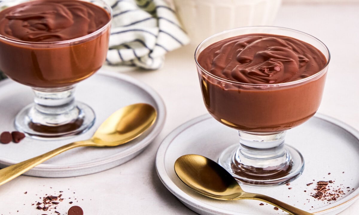 Two glass cups full of 5 Ingredient Homemade Chocolate Pudding.
