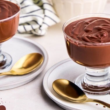 Two glass cups full of 5 Ingredient Homemade Chocolate Pudding.