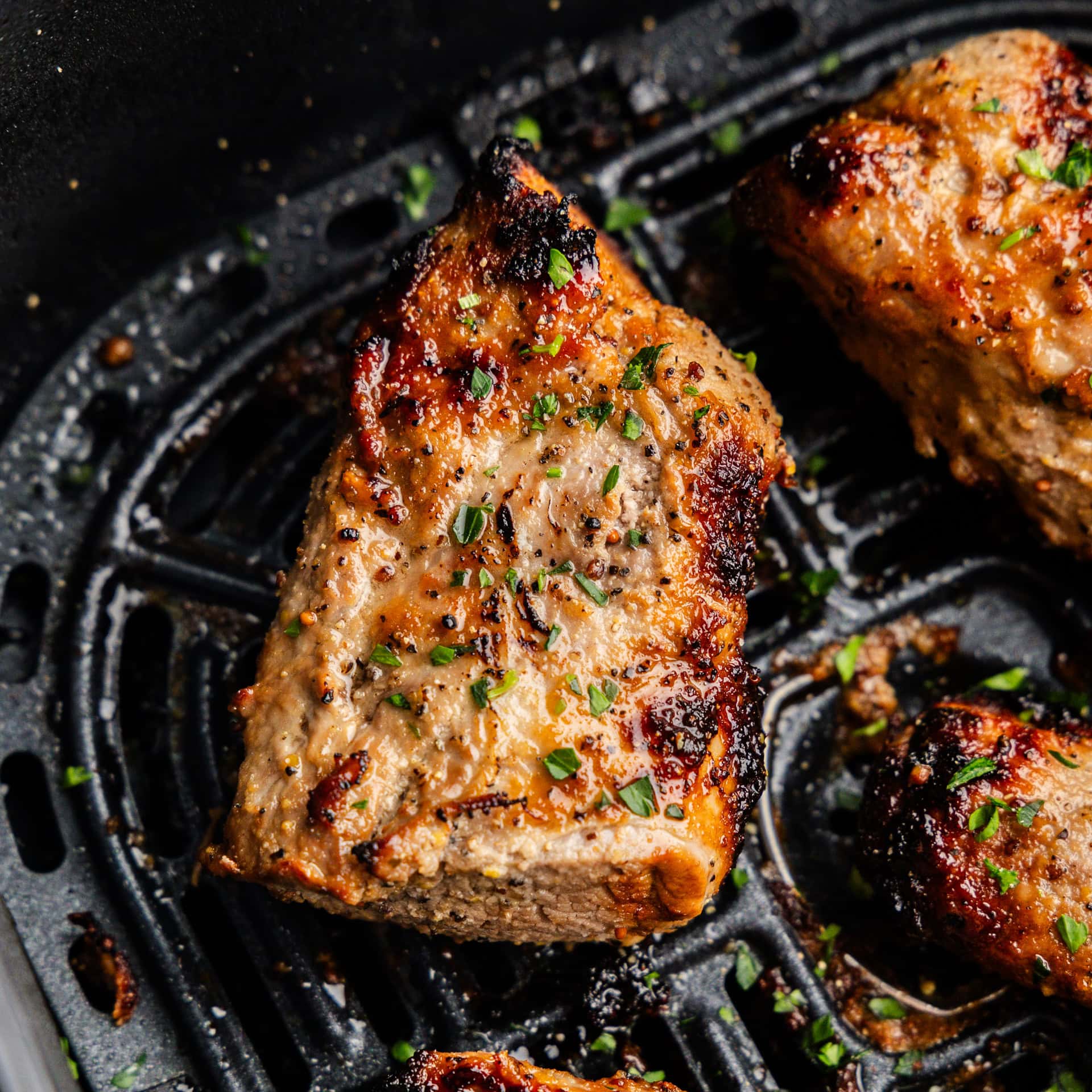Closeup of Pork tenderloin in the air fryer.