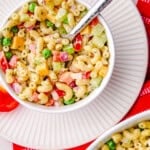 Best Macaroni Salad in a bowl with a spoon.