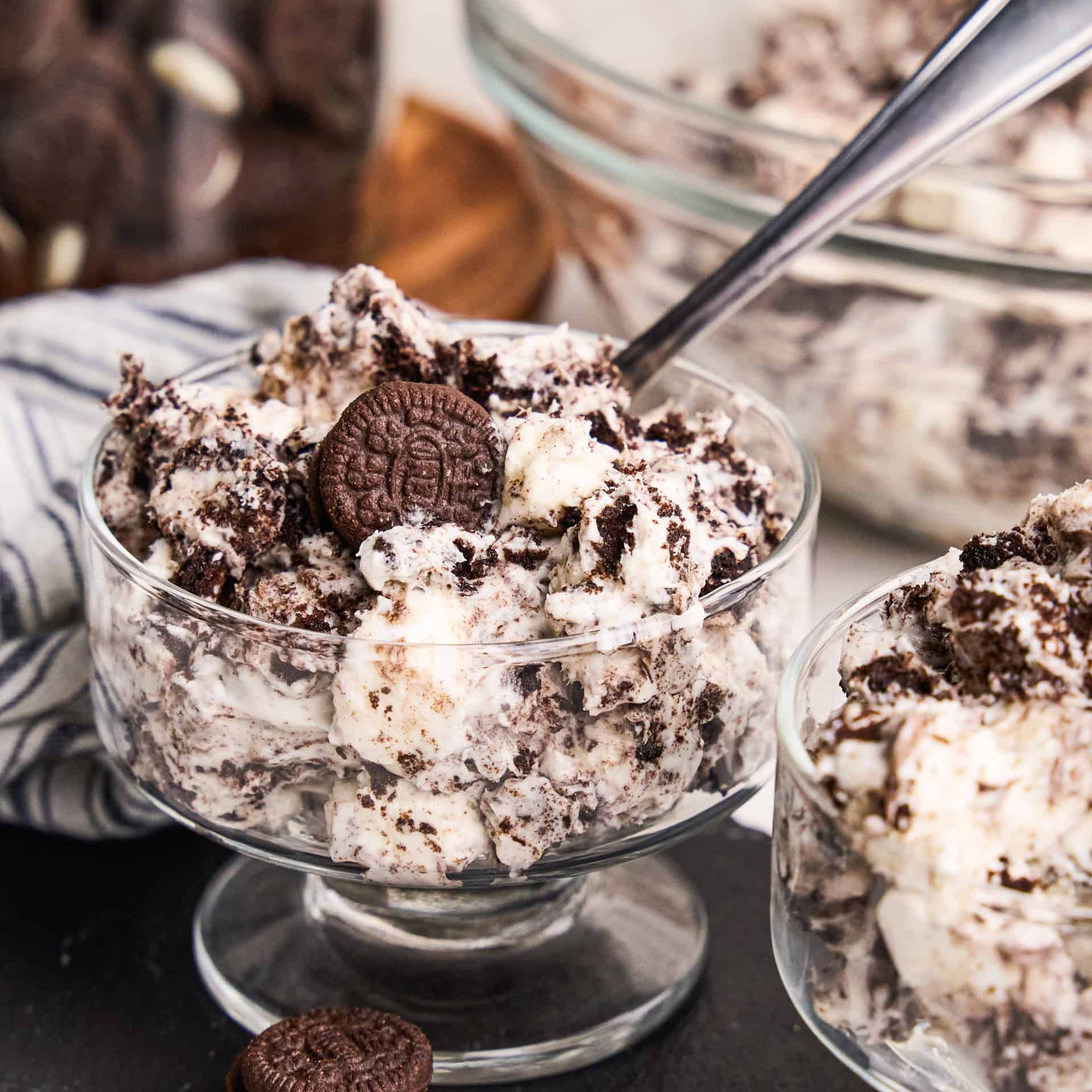 Oreo Fluff in a parfait cup with spoon in it.