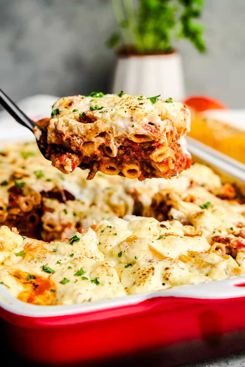 A Slice of the Best Baked Ziti Ever on a spatula.