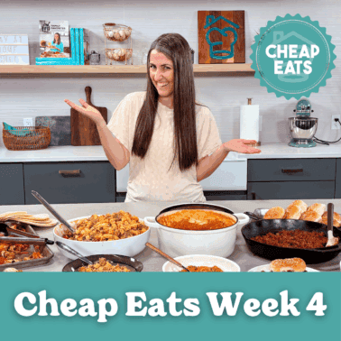 A photo of Rachel in The Stay At Home Chef Kitchen with the meals from Week 4 of the Cheap Eats Meal plan on display on the kitchen counter.
