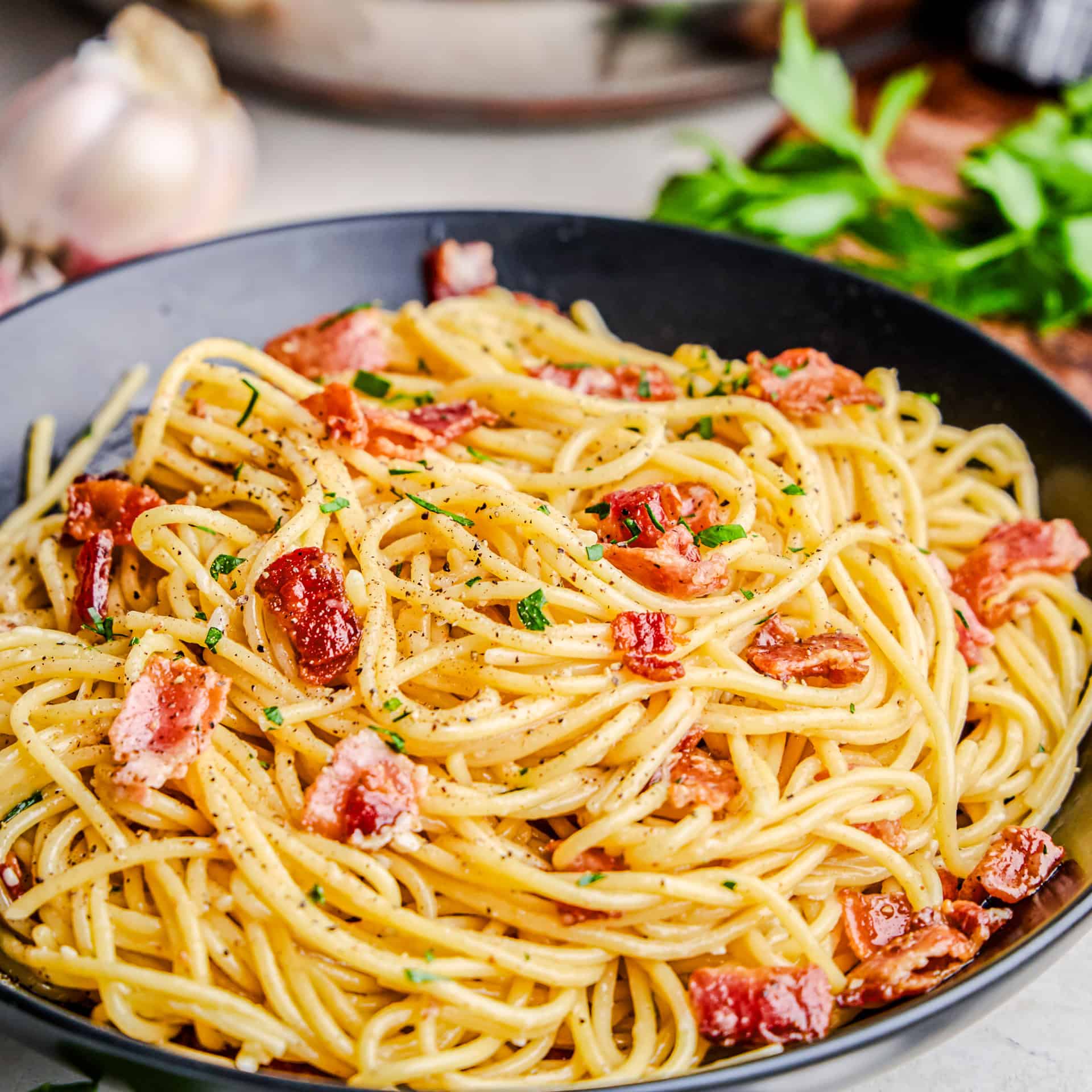 A bowl full of Eggless Spaghetti Carbonara.