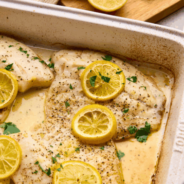 Easy Lemon Garlic Baked Tilapia in a baking dish.