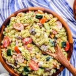 Overhead image of Whipped Feta Greek Pasta Salad in a large wooden serving bowl.