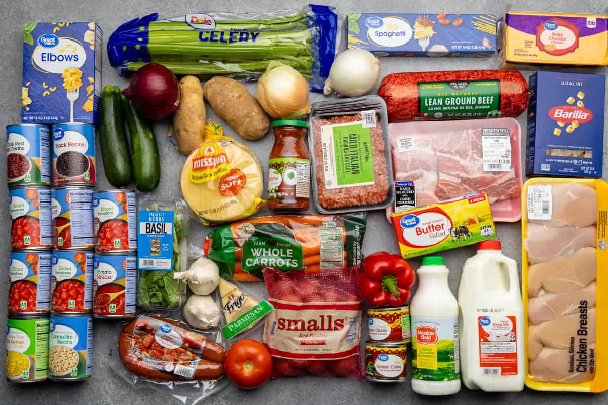 An overhead view of the groceries needed for Week 4 of the Cheap Eats Meal Plan from The Stay At Home Chef.